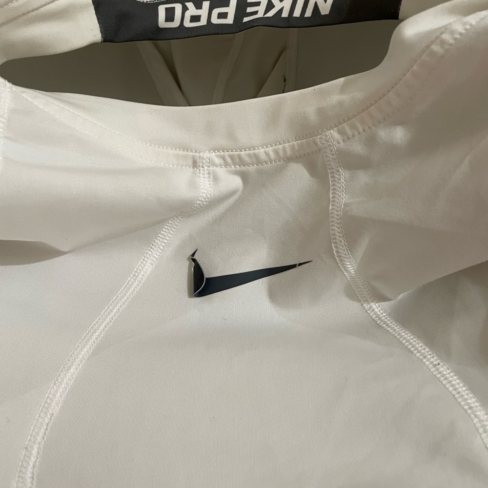 Nike Mens Nike padded compression shirt Size Large. Used - chest swoosh loose!